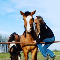 Alt foto Nicole Berlusconi e cavalli