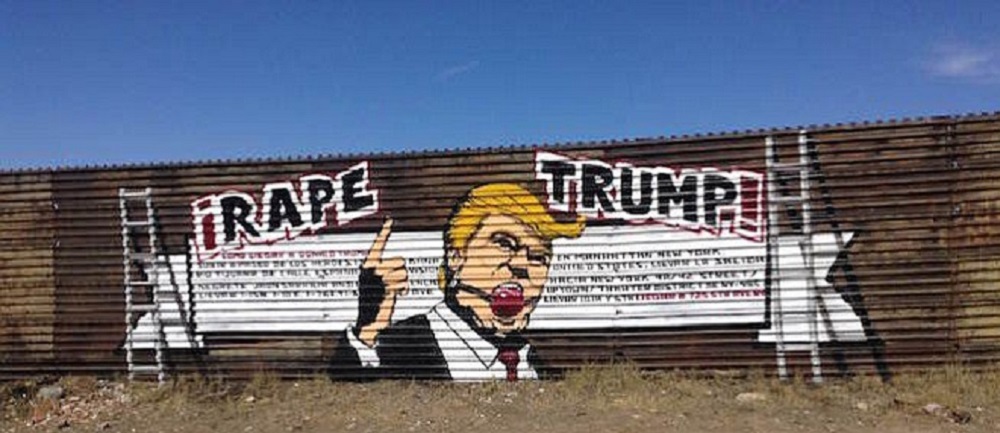 Un graffito che raffigura Donald Trump con un bavaglio alla bocca; la scritta recita "I rape Trump", vale a dire "Io violento Trump"